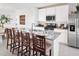 Modern kitchen featuring white cabinets, granite countertops, and an island at 3902 Radiant Mountain Dr, Plant City, FL 33565