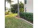 Neatly landscaped grounds with manicured hedges and lush lawn at 601 Shreve St # 51A, Punta Gorda, FL 33950