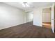 Bedroom with mirrored closet doors and carpet flooring at 6629 Pineview Ter # 5-201, Bradenton, FL 34203
