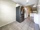 Stainless steel refrigerator in a spacious kitchen at 6629 Pineview Ter # 5-201, Bradenton, FL 34203