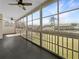 Screened lanai with ceiling fans and scenic views at 6629 Pineview Ter # 5-201, Bradenton, FL 34203