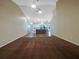 Spacious living room with high ceilings and a ceiling fan at 6629 Pineview Ter # 5-201, Bradenton, FL 34203