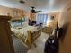Well-lit bedroom featuring a comfortable double bed at 1041 Porpoise Rd, Venice, FL 34293