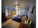Cozy bedroom with a double bed and decorative elements at 1041 Porpoise Rd, Venice, FL 34293