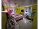 Colorful bedroom with a bed and fun decor at 1041 Porpoise Rd, Venice, FL 34293