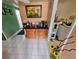 Kitchen with wood cabinets, granite countertop, and a coffee bar at 1041 Porpoise Rd, Venice, FL 34293