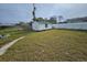 White storage shed in the spacious backyard at 1041 Porpoise Rd, Venice, FL 34293