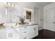 Modern bathroom with double vanity and white cabinets at 3927 Shady Meadow Dr, Plant City, FL 33567