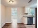 Modern kitchen with stainless steel appliances and granite countertops at 11615 Meadow Dr, Port Richey, FL 34668