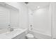 Bright bathroom with white tiles and a vanity with a sink at 13847 Richland Gulf Cir, Parrish, FL 34219