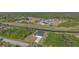 House on a canal with surrounding houses visible at 1649 N San Mateo Dr, North Port, FL 34288