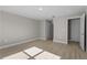 Spacious bedroom with wood-look flooring and lots of natural light at 1649 N San Mateo Dr, North Port, FL 34288