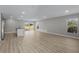 Open concept kitchen, stainless steel appliances, and granite island at 1649 N San Mateo Dr, North Port, FL 34288