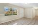Bright dining area with tile floors and large window at 205 Larson Ave, Brandon, FL 33510