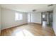 Bright bedroom with wood floors and access to bathroom at 1490 Fundy Rd, Venice, FL 34293