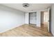 Light and airy bedroom with a spacious closet and wood flooring at 1490 Fundy Rd, Venice, FL 34293
