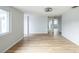 Bright bedroom with wood floors and large window at 1490 Fundy Rd, Venice, FL 34293