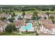 Aerial view of community featuring pool, buildings, and landscaping at 17952 Villa Creek Dr # 17952, Tampa, FL 33647