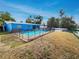 Home with fenced pool and backyard view at 4430 Huntington Ne St, St Petersburg, FL 33703