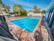 Inviting refreshing blue pool with fenced area at 4430 Huntington Ne St, St Petersburg, FL 33703