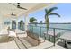 Relaxing balcony overlooking the water with outdoor seating at 7801 9Th S Ave, St Petersburg, FL 33707