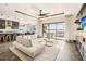 Living area with open floor plan, modern furniture and water views at 7801 9Th S Ave, St Petersburg, FL 33707