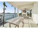 Spacious patio with a unique concrete table and water views at 7801 9Th S Ave, St Petersburg, FL 33707