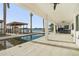 Enjoy this refreshing pool and spacious patio overlooking the water at 7801 9Th S Ave, St Petersburg, FL 33707