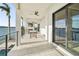 Expansive waterfront deck with stunning water views, offering ample space for relaxation and entertainment at 7801 9Th S Ave, St Petersburg, FL 33707