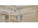 Two story living room with loft and hardwood flooring at 304 Tavernier Dr, Oldsmar, FL 34677