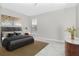 Spacious bedroom with large window and stylish decor at 33161 Kateland Dr, Wesley Chapel, FL 33545