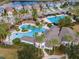 Community pool with lap lanes, water features, and lounge area at 33161 Kateland Dr, Wesley Chapel, FL 33545