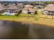 Luxury home with pool and spa, nestled by a lake at 33161 Kateland Dr, Wesley Chapel, FL 33545