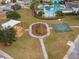 Community park with playground, basketball court, and seating at 33161 Kateland Dr, Wesley Chapel, FL 33545
