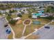 Community park with playground, basketball court, and seating at 33161 Kateland Dr, Wesley Chapel, FL 33545