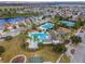 Community pool with lap lanes, water features, and lounge area at 33161 Kateland Dr, Wesley Chapel, FL 33545