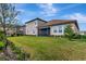 Home with large backyard and screened patio at 33161 Kateland Dr, Wesley Chapel, FL 33545