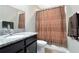 Clean bathroom with granite countertop and shower/tub combo at 33161 Kateland Dr, Wesley Chapel, FL 33545