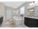 Elegant bathroom with soaking tub, double vanity, and separate shower at 33161 Kateland Dr, Wesley Chapel, FL 33545
