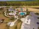 Community pool with playground, gazebo, and ample parking at 33161 Kateland Dr, Wesley Chapel, FL 33545