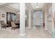 Formal dining room with a large table, chairs, and a china cabinet at 33161 Kateland Dr, Wesley Chapel, FL 33545