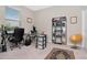Bright home office featuring a desk, chair, and shelving at 33161 Kateland Dr, Wesley Chapel, FL 33545