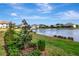 Peaceful lakefront property with mature trees at 33161 Kateland Dr, Wesley Chapel, FL 33545