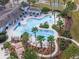 Freeform pool with a water feature and lounge chairs at 33161 Kateland Dr, Wesley Chapel, FL 33545