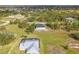 Single Gathering home in a community, featuring large grassy lots and scattered trees at 16760 Acapulco Rd, Punta Gorda, FL 33955