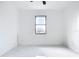 Bright bedroom with a single window providing plenty of natural light and marble flooring at 16760 Acapulco Rd, Punta Gorda, FL 33955