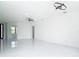 Spacious living area with modern lighting and large windows at 16760 Acapulco Rd, Punta Gorda, FL 33955