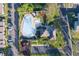 Aerial view of community pool, playground, and parking lot at 275 114Th N Ave # 2, St Petersburg, FL 33716
