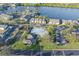Aerial view showing community pool, playground, and ample parking at 275 114Th N Ave # 2, St Petersburg, FL 33716
