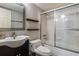 Updated bathroom with a tub shower combo and modern vanity at 275 114Th N Ave # 2, St Petersburg, FL 33716